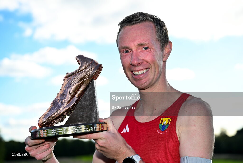 18 October 2026; Sean Doyle of Cork City AC with the Jim McNamara trophy after winning the Master Men 7500m during the Autumn Open Cross Country International at the Sport Ireland Campus in Dublin. Photo by Sam Barnes/Sportsfile