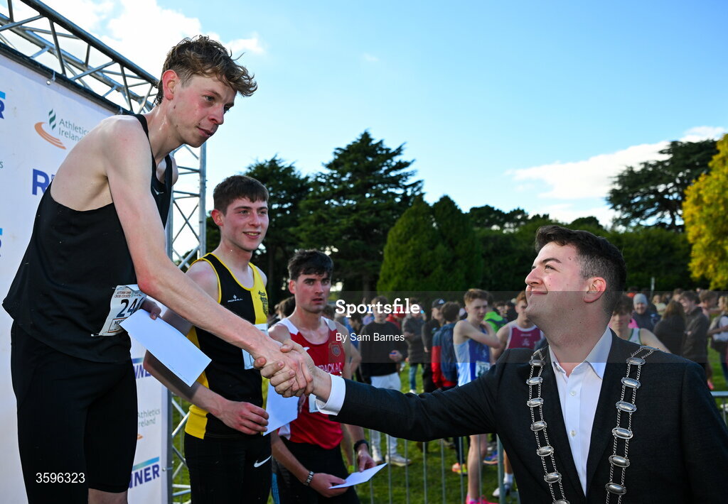 18 October 2026; Tony McCambridge of CNDR Track AC, is congratulated by Deputy Mayor of Fingal Luke Corkery after winning Senior Men 7500m during the Autumn Open Cross Country International at the Sport Ireland Campus in Dublin. Photo by Sam Barnes/Sportsfile