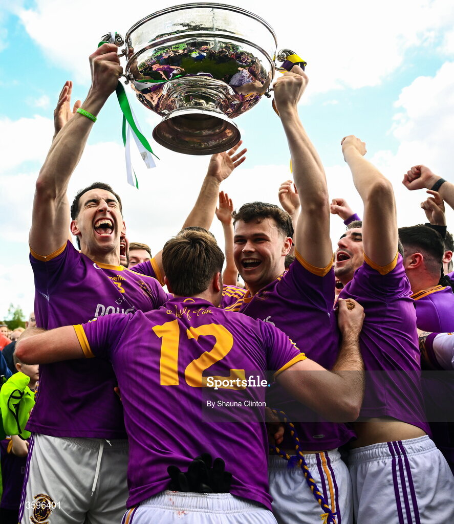 18 October 2026; Wolfe Tones players celebrate with the Keegan Cup after their side's victory in the Meath County Senior Club Football Championship final match between Wolfe Tones and Donaghmore/ Ashbourne at Donaghmore-Ashbourne GAA Club in Ashbourne, Meath. Photo by Shauna Clinton/Sportsfile