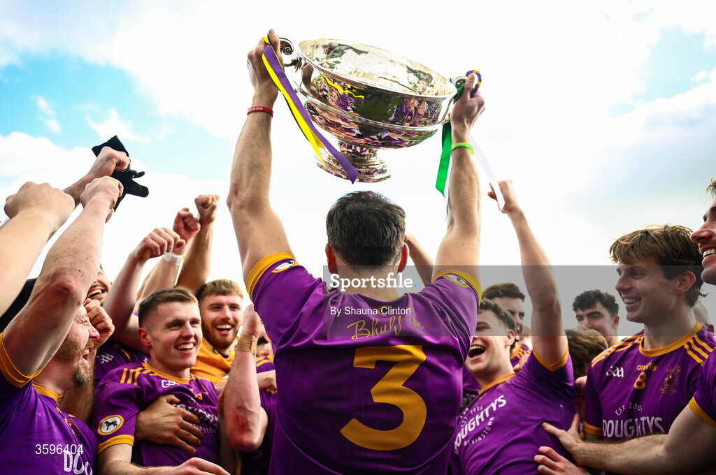 18 October 2026; Wolfe Tones players celebrate with the Keegan Cup after their side's victory in the Meath County Senior Club Football Championship final match between Wolfe Tones and Donaghmore/ Ashbourne at Donaghmore-Ashbourne GAA Club in Ashbourne, Meath. Photo by Shauna Clinton/Sportsfile