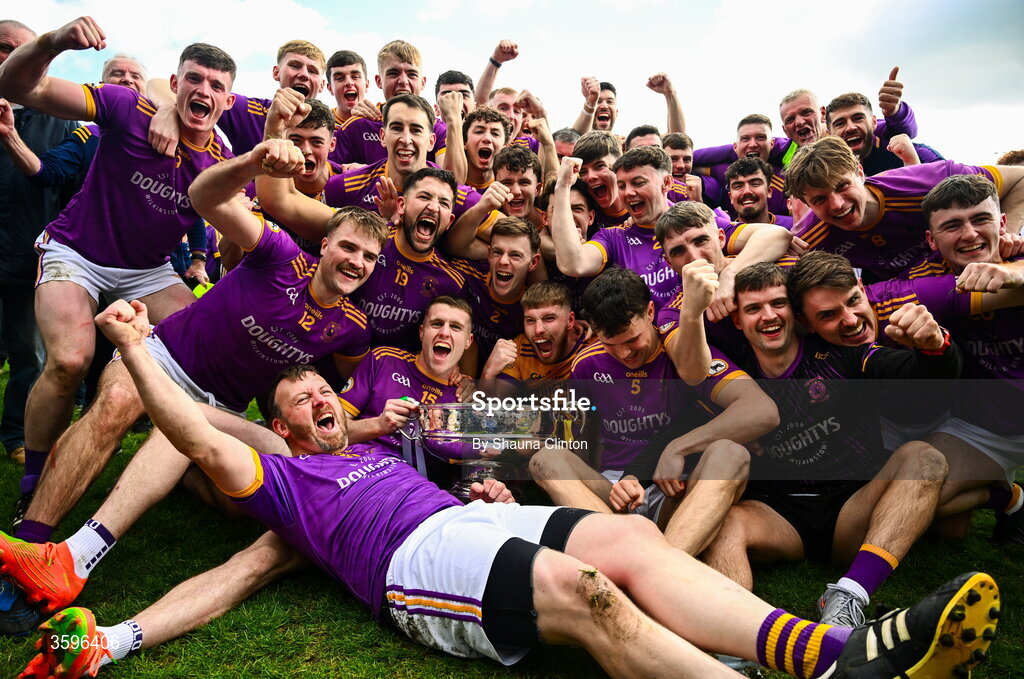 18 October 2026; Wolfe Tones players celebrate with the Keegan Cup after their side's victory in the Meath County Senior Club Football Championship final match between Wolfe Tones and Donaghmore/ Ashbourne at Donaghmore-Ashbourne GAA Club in Ashbourne, Meath. Photo by Shauna Clinton/Sportsfile