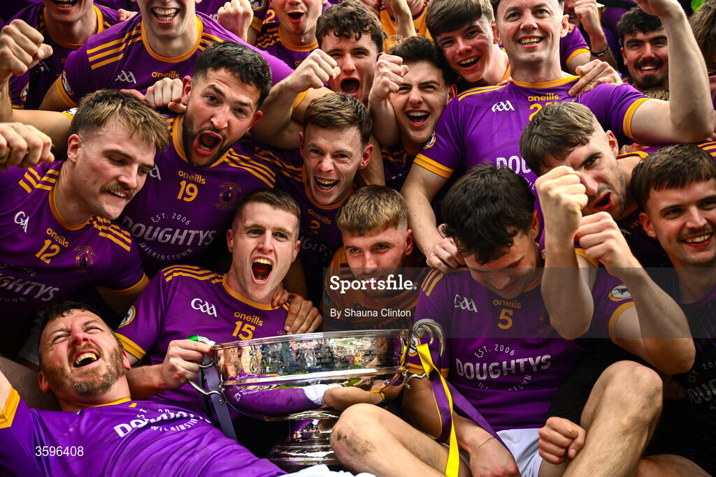18 October 2026; Wolfe Tones players celebrate with the Keegan Cup after their side's victory in the Meath County Senior Club Football Championship final match between Wolfe Tones and Donaghmore/ Ashbourne at Donaghmore-Ashbourne GAA Club in Ashbourne, Meath. Photo by Shauna Clinton/Sportsfile