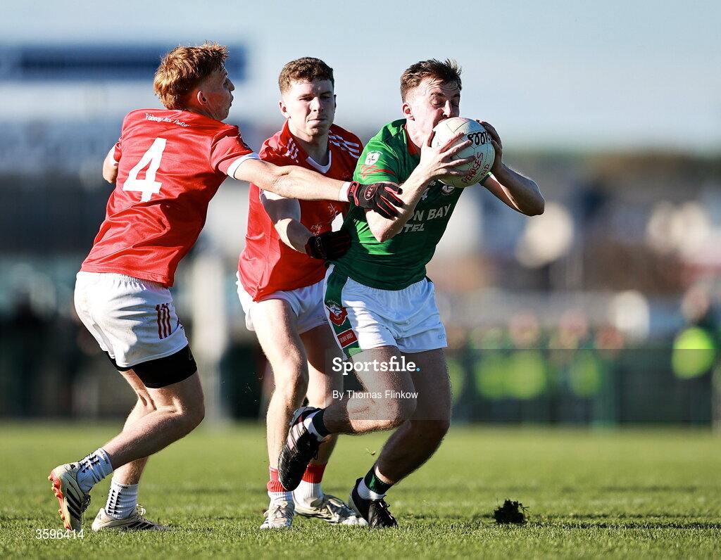 18 October 2026; Ciaran Sugrue of St Brigid's in action against Pádraig Pearses players Jack Downey, left, and Declan Kenny, back, during the Roscommon County Senior Club Football Championship final match between Pádraig Pearses and St Brigid's at King & Moffatt Dr Hyde Park in Roscommon. Photo by Thomas Flinkow/Sportsfile