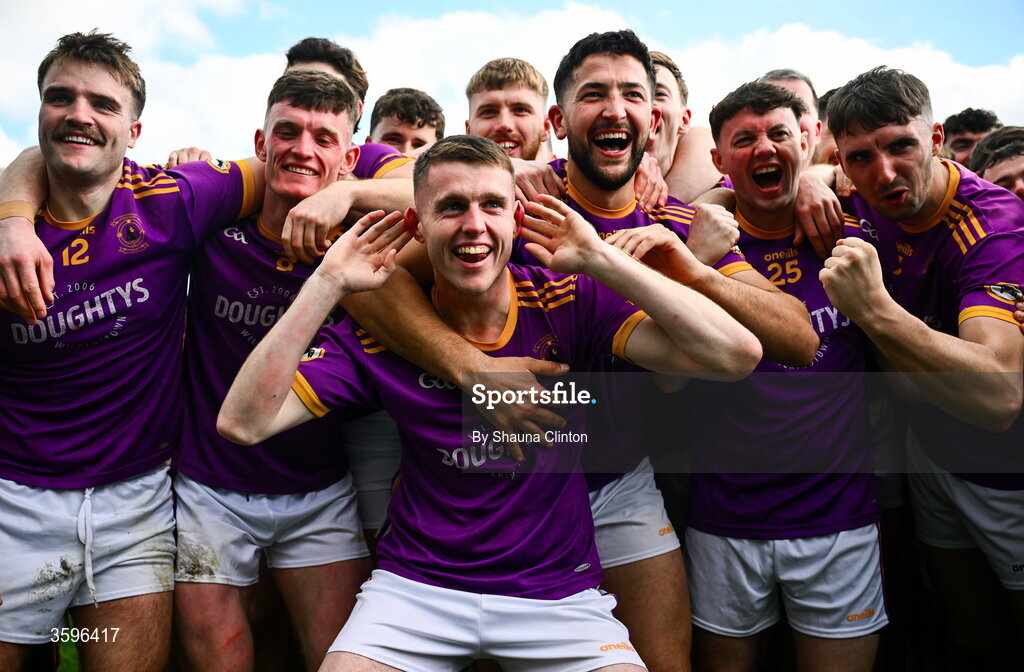 18 October 2026; Wolfe Tones players, including Kyle Moran, centre, celebrate after their side's victory in the Meath County Senior Club Football Championship final match between Wolfe Tones and Donaghmore/ Ashbourne at Donaghmore-Ashbourne GAA Club in Ashbourne, Meath. Photo by Shauna Clinton/Sportsfile