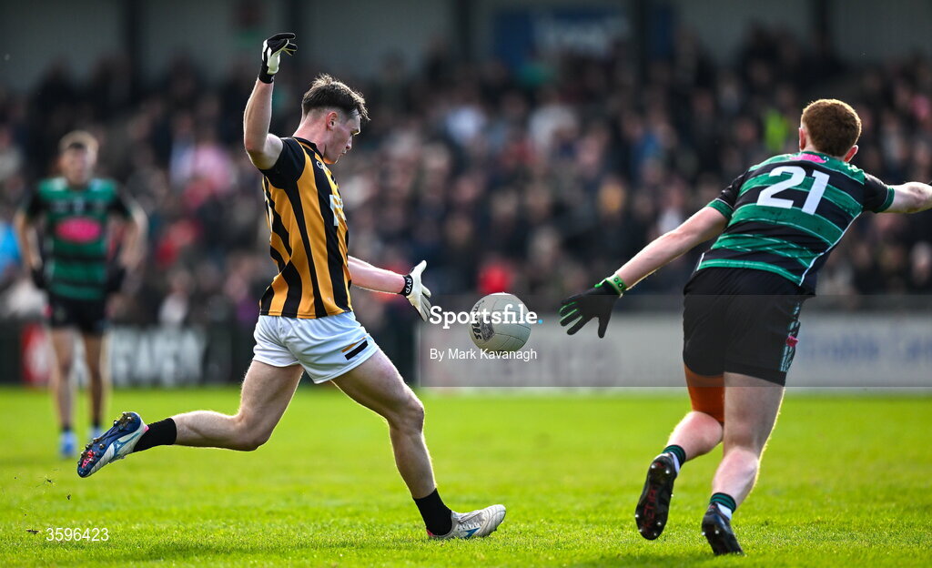 18 October 2026; Harry Cumiskey of Crossmaglen Rangers attempts a shot on goal despite pressure from Callum O'Hare of Killeavy St Moninna during the Armagh County Senior Club Football Championship final match between Killeavy St Moninna and Crossmaglen Rangers at BOX-IT Athletic Grounds in Armagh. Photo by Mark Kavanagh/Sportsfile