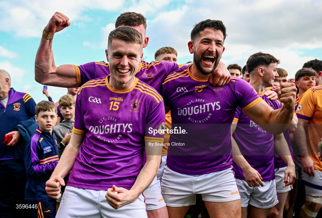 18 October 2026; Wolfe Tones players, including Kyle Moran, centre left, and Padraic Diamond, centre right, celebrate after their side's victory in the Meath County Senior Club Football Championship final match between Wolfe Tones and Donaghmore/ Ashbourne at Donaghmore-Ashbourne GAA Club in Ashbourne, Meath. Photo by Shauna Clinton/Sportsfile