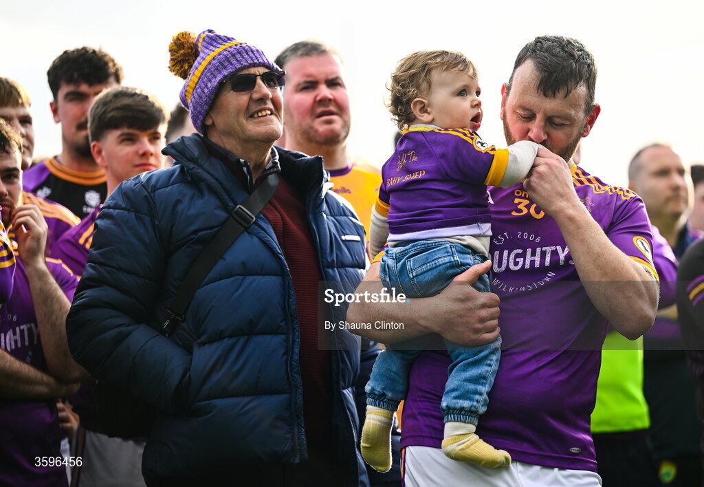 18 October 2026; Stephen Sheppard of Wolfe Tones celebrates with his son Oisín after their side's victory in the Meath County Senior Club Football Championship final match between Wolfe Tones and Donaghmore/ Ashbourne at Donaghmore-Ashbourne GAA Club in Ashbourne, Meath. Photo by Shauna Clinton/Sportsfile