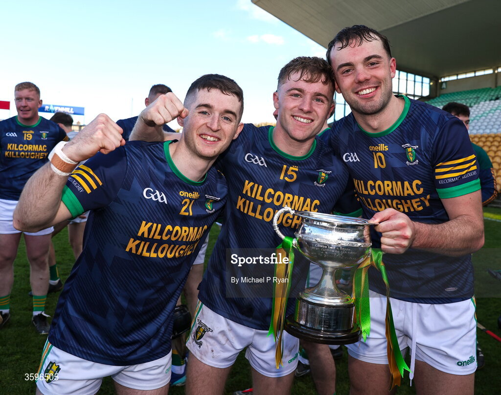 18 October 2026; Kilcormac - Killoughey players from left, Lochlann Kavanagh, Adam Screeney, and Daniel Hand celebrate with the Sean Robbins Cup after the Offaly County Senior Club Hurling Championship final match between Kilcormac - Killoughey and Ballinamerey at Glenisk O'Connor Park in Tullamore, Offaly. Photo by Michael P Ryan/Sportsfile