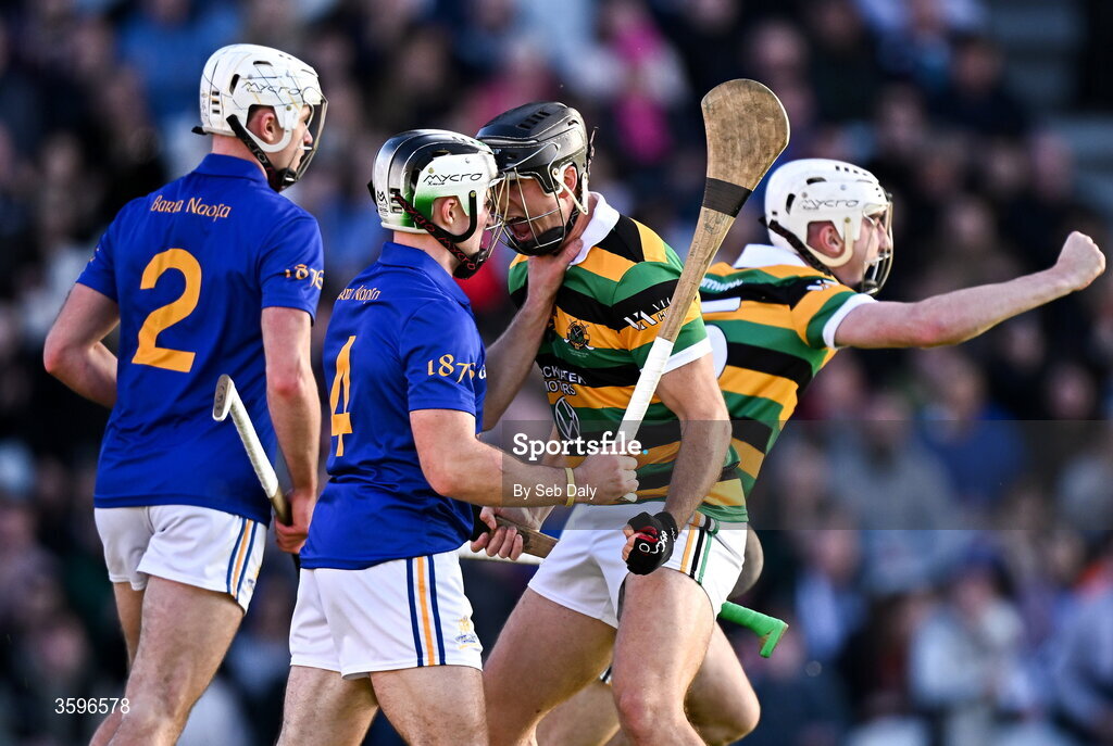 18 October 2026; Simon Kennefick of Glen Rovers celebrates his side's first goal in front of Seán Daly of St Finbarr’s, scored by teammate Eoin O’Leary, right, during the Cork County Premier Senior Club Hurling Championship final match between Glen Rovers and St Finbarr's at SuperValu Páirc Uí Chaoimh in Cork. Photo by Seb Daly/Sportsfile