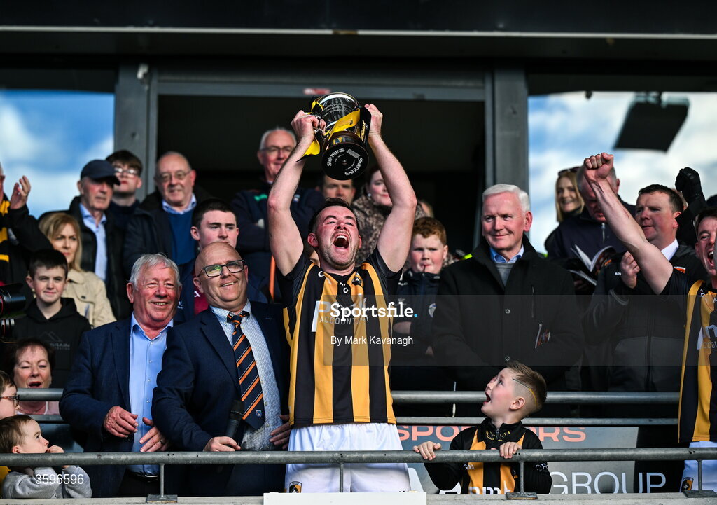 18 October 2026; Callum Cumiskey of Crossmaglen Rangers lifts the Gerry Fagan Cup after his side's win in the Armagh County Senior Club Football Championship final match between Killeavy St Moninna and Crossmaglen Rangers at BOX-IT Athletic Grounds in Armagh. Photo by Mark Kavanagh/Sportsfile
