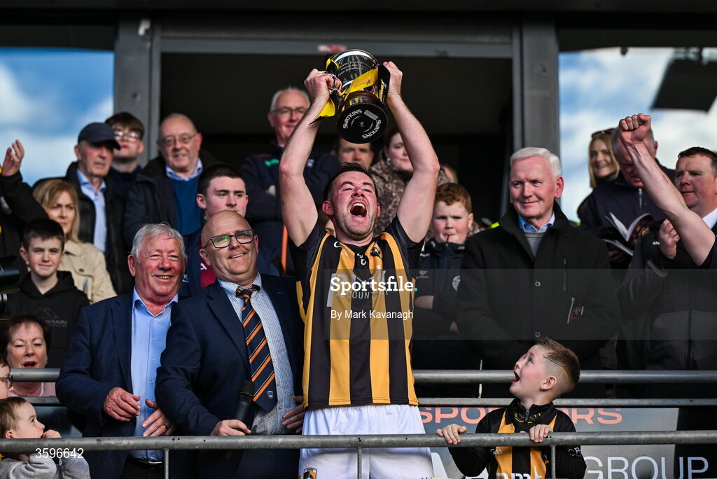 18 October 2026; Callum Cumiskey of Crossmaglen Rangers lifts the Gerry Fagan Cup after his side's win in the Armagh County Senior Club Football Championship final match between Killeavy St Moninna and Crossmaglen Rangers at BOX-IT Athletic Grounds in Armagh. Photo by Mark Kavanagh/Sportsfile