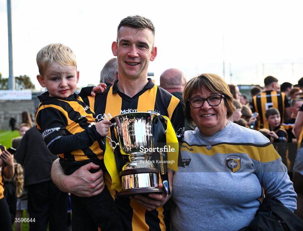 18 October 2026; Paul Hughes of Crossmaglen Rangers celebrates with his his mother and son his side's win in the Armagh County Senior Club Football Championship final match between Killeavy St Moninna and Crossmaglen Rangers at BOX-IT Athletic Grounds in Armagh. Photo by Mark Kavanagh/Sportsfile