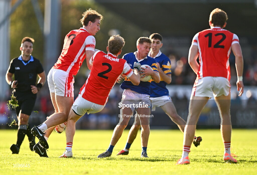 18 October 2026; Conor Chawke of Castleknock gets away from Peadar Ó Cofaigh Byrne, 8, and Danny Conroy, 2, of Cuala during the PTSB Dublin County Senior Club Football Championship final match between Castleknock and Cuala at Parnell Park in Dublin. Photo by Piaras Ó Mídheach/Sportsfile