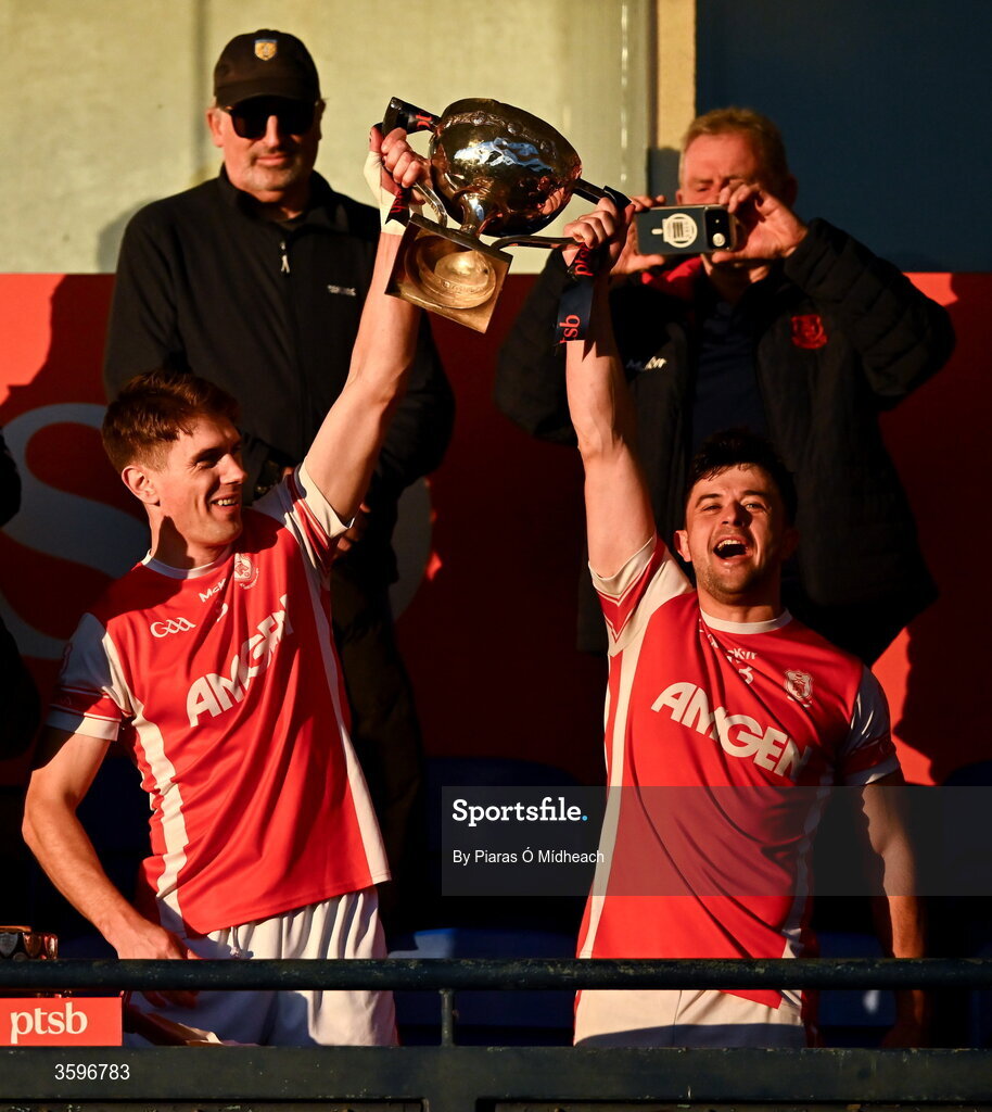 18 October 2026; Cuala players Michael Fitzsimons, left, and Conor O’Brien lift the cup after their side's victory in the PTSB Dublin County Senior Club Football Championship final match between Castleknock and Cuala at Parnell Park in Dublin. Photo by Piaras Ó Mídheach/Sportsfile
