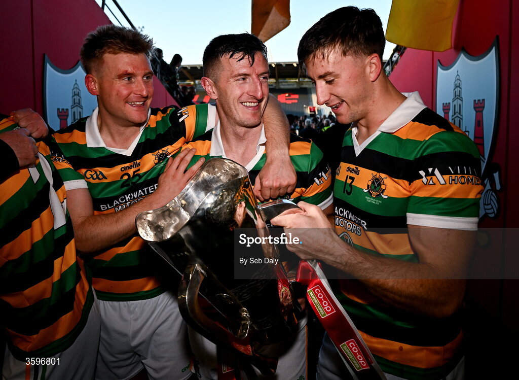 18 October 2026; Glen Rovers players Patrick Horgan, centre, David Dooling, left, and Simon Kennefick with the Seán Óg Murphy Cup after their side's victory in the Cork County Premier Senior Club Hurling Championship final match between Glen Rovers and St Finbarr's at SuperValu Páirc Uí Chaoimh in Cork. Photo by Seb Daly/Sportsfile