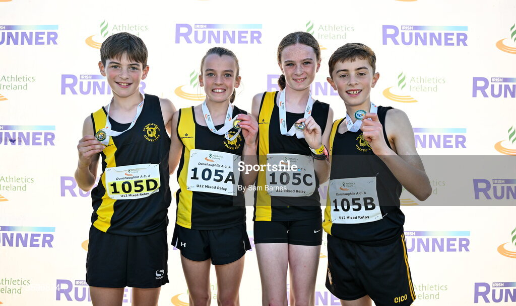 18 October 2026; The Dunshaughlin AC A, Meath, team, from left, Daniel Kealy, Sophie O'Reilly, Kate Shanahan and Rian Murphy, after winning the U12 4x500m Mixed Relay during the Autumn Open Cross Country International at the Sport Ireland Campus in Dublin. Photo by Sam Barnes/Sportsfile