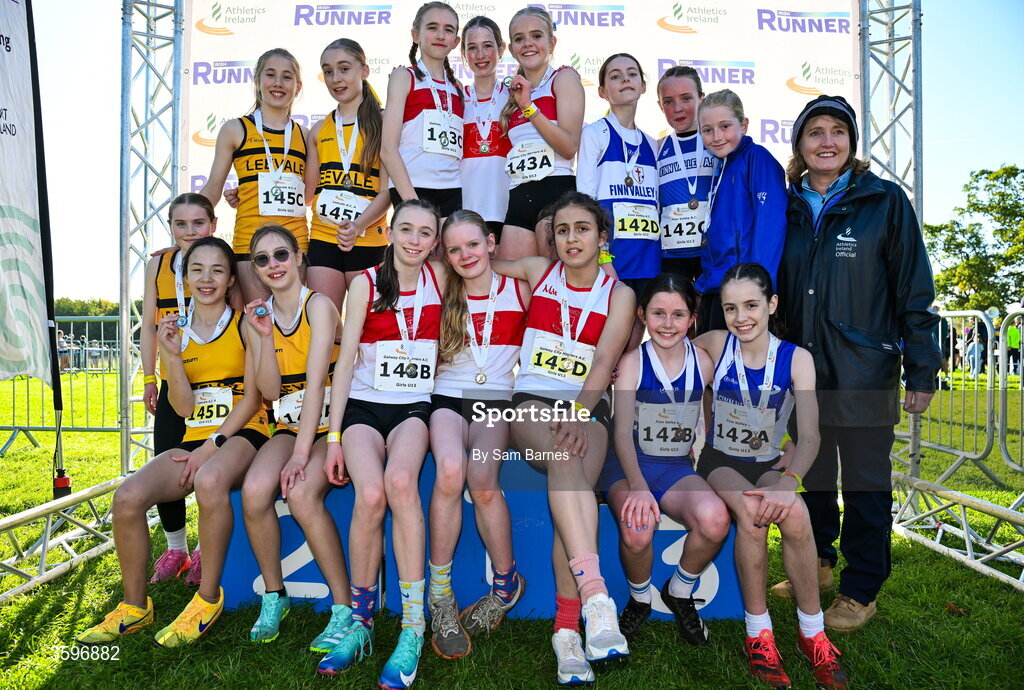 18 October 2026; Athletics Ireland President Brid Golden with U13 Girls 4x500m Relay medallists, Galway City Harriers AC, centre, gold, Leevale AC A, Cork, left, silver, and Finn Valley AC, Donegal, right, bronze, during the Autumn Open Cross Country International at the Sport Ireland Campus in Dublin. Photo by Sam Barnes/Sportsfile