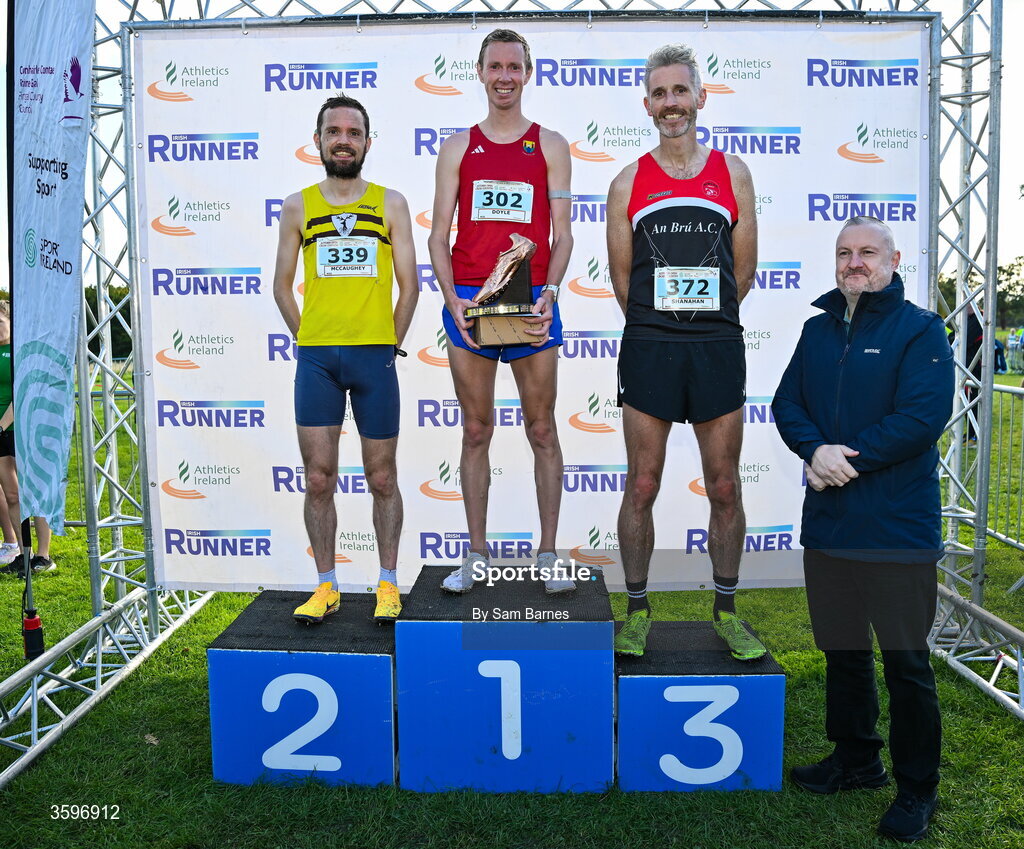 18 October 2026; Shane McNamara, right, with Master Men 7500m top 3 finishers, Sean Doyle of Cork City AC, centre, first, Conán Mccaughey of North Belfast Harriers, Antrim, left, second, and Niall Shanahan of An Bru AC, right, third, during the Autumn Open Cross Country International at the Sport Ireland Campus in Dublin. Photo by Sam Barnes/Sportsfile