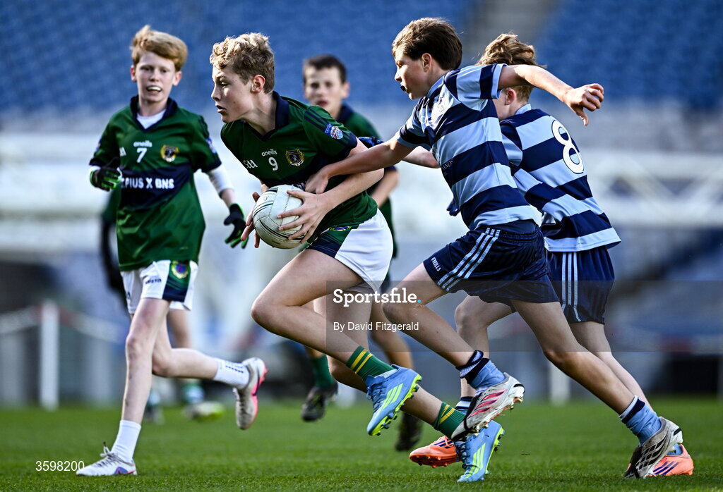 20 October 2026; Sean Harrison of St Pius X BNS in action against Sam Gahan of St Helen's SNS during day two of the Cumann na mBunscol 2026 Autumn Football finals match between St Pius X Boys National School and St. Helen's SNS at Croke Park in Dublin. Photo by David Fitzgerald/Sportsfile