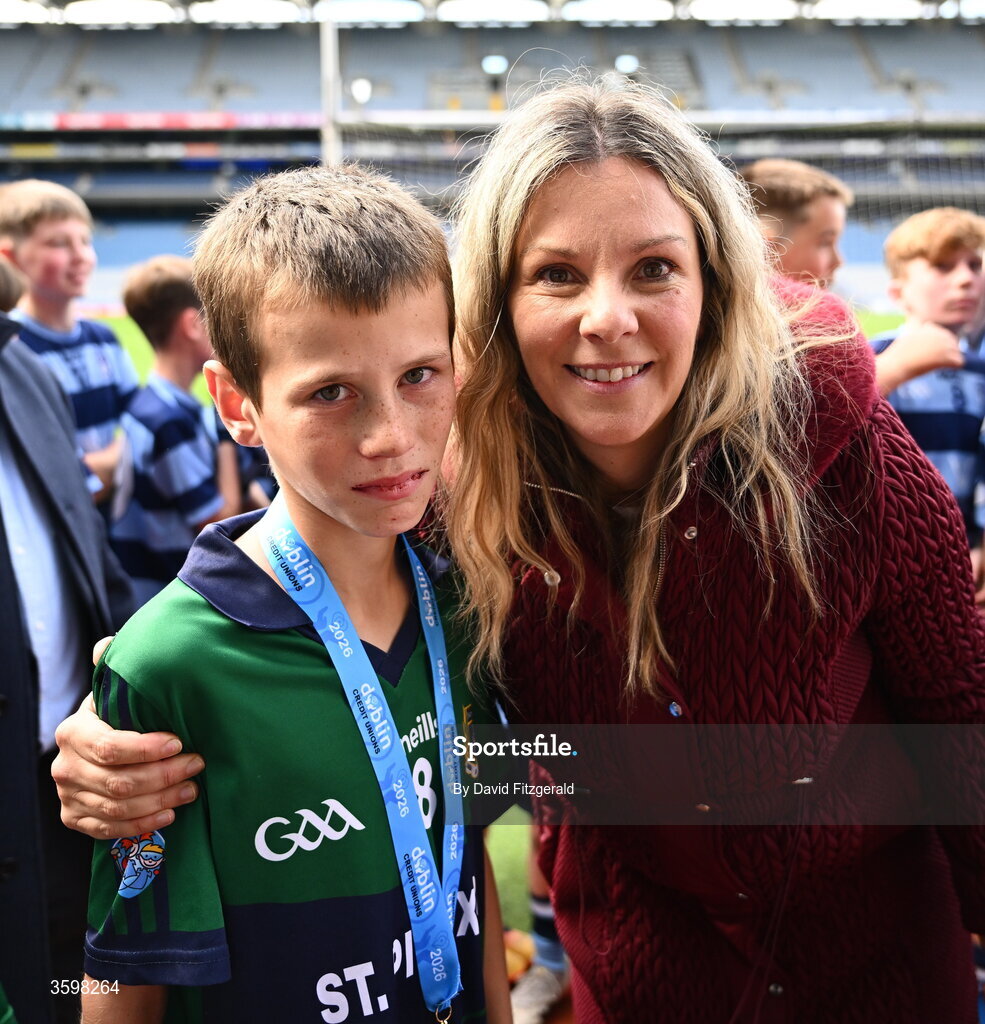 20 October 2026; RTE Presenter Marie Crowe with her son Billy Sheehan of St Pius X BNS during day two of the Cumann na mBunscol 2026 Autumn Football finals match between St Pius X Boys National School and St. Helen's SNS at Croke Park in Dublin. Photo by David Fitzgerald/Sportsfile