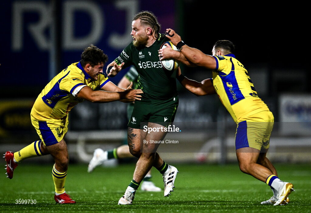 23 October 2026; Finlay Bealham of Connacht is tackled by Zebre Parma players Mirko Belloni, left, and Marco Zanon during the United Rugby Championship match between Connacht and Zebre Parma at Dexcom Stadium in Galway. Photo by Shauna Clinton/Sportsfile