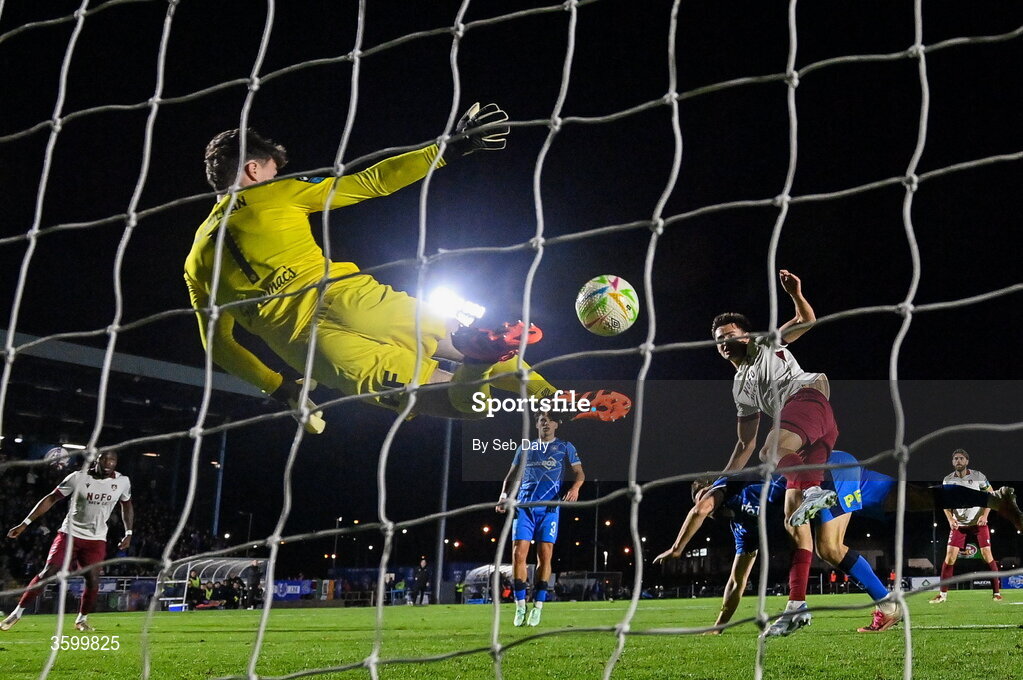 23 October 2026; Leo Burney of Drogheda United scores his side's first goal, past Waterford goalkeeper Stephen McMullan, during the SSE Airtricity Men's Premier Division match between Waterford and Drogheda United at RSC in Waterford. Photo by Seb Daly/Sportsfile