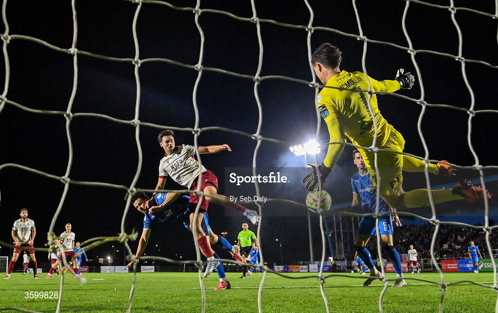 23 October 2026; Leo Burney of Drogheda United scores his side's first goal, past Waterford goalkeeper Stephen McMullan, during the SSE Airtricity Men's Premier Division match between Waterford and Drogheda United at RSC in Waterford. Photo by Seb Daly/Sportsfile