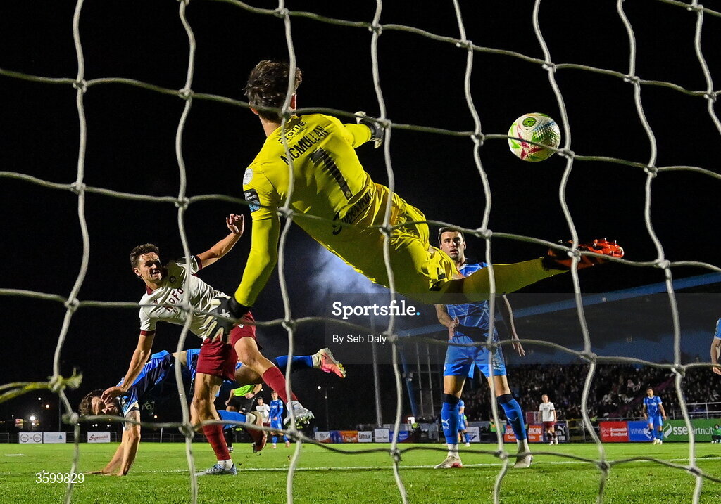 23 October 2026; Leo Burney of Drogheda United scores his side's first goal, past Waterford goalkeeper Stephen McMullan, during the SSE Airtricity Men's Premier Division match between Waterford and Drogheda United at RSC in Waterford. Photo by Seb Daly/Sportsfile