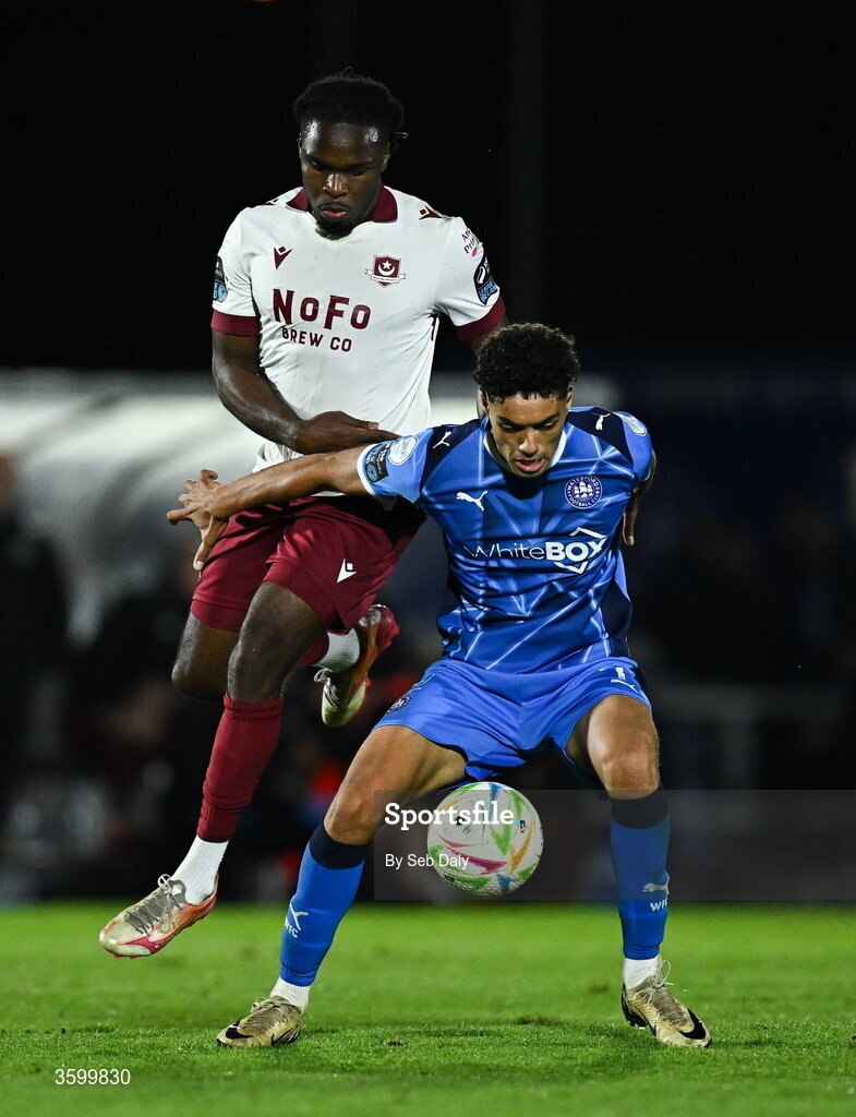 23 October 2026; Noah Mawene of Waterford in action against Thomas Oluwa of Drogheda United during the SSE Airtricity Men's Premier Division match between Waterford and Drogheda United at RSC in Waterford. Photo by Seb Daly/Sportsfile