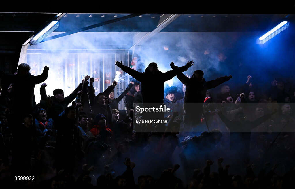 23 October 2026; Shelbourne supporters celebrate their first goal during the SSE Airtricity Men's Premier Division match between Bohemians and Shelbourne at Dalymount Park in Dublin. Photo by Ben McShane/Sportsfile