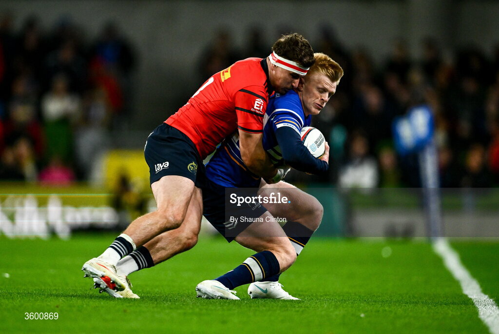 24 October 2026; Tommy O'Brien of Leinster is tackled by Shane Daly of Munster during the United Rugby Championship match between Leinster and Munster at the Aviva Stadium in Dublin. Photo by Shauna Clinton/Sportsfile