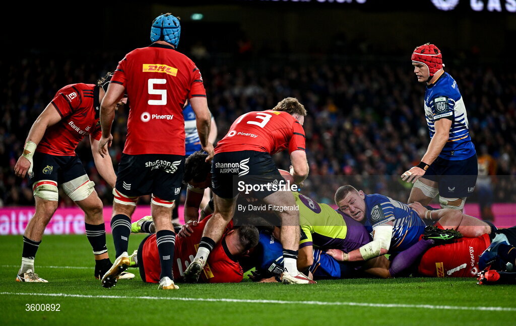 24 October 2026; Referee Andrew Brace gets caught up in a ruck, which lead to a scrum leading to the opening Leinster try, during the United Rugby Championship match between Leinster and Munster at the Aviva Stadium in Dublin. Photo by David Fitzgerald/Sportsfile