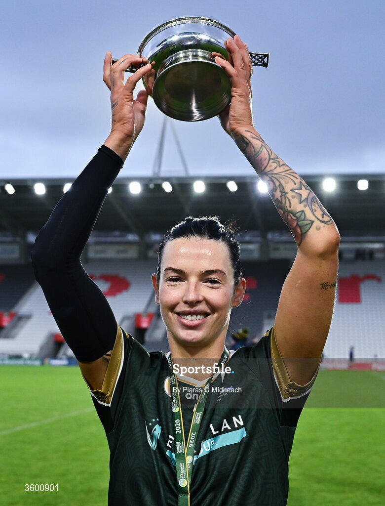 24 October 2026; Ireland captain Ashling Thompson lifts the trophy after her side's victory in the 2026 Camogie/Shinty International match between Ireland and Scotland at SuperValu Páirc Uí Chaoimh in Cork. Photo by Piaras Ó Mídheach/Sportsfile