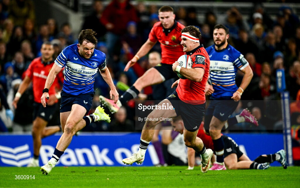 24 October 2026; Shane Daly of Munster makes a break on his way to scoring his side's opening try during the United Rugby Championship match between Leinster and Munster at the Aviva Stadium in Dublin. Photo by Shauna Clinton/Sportsfile