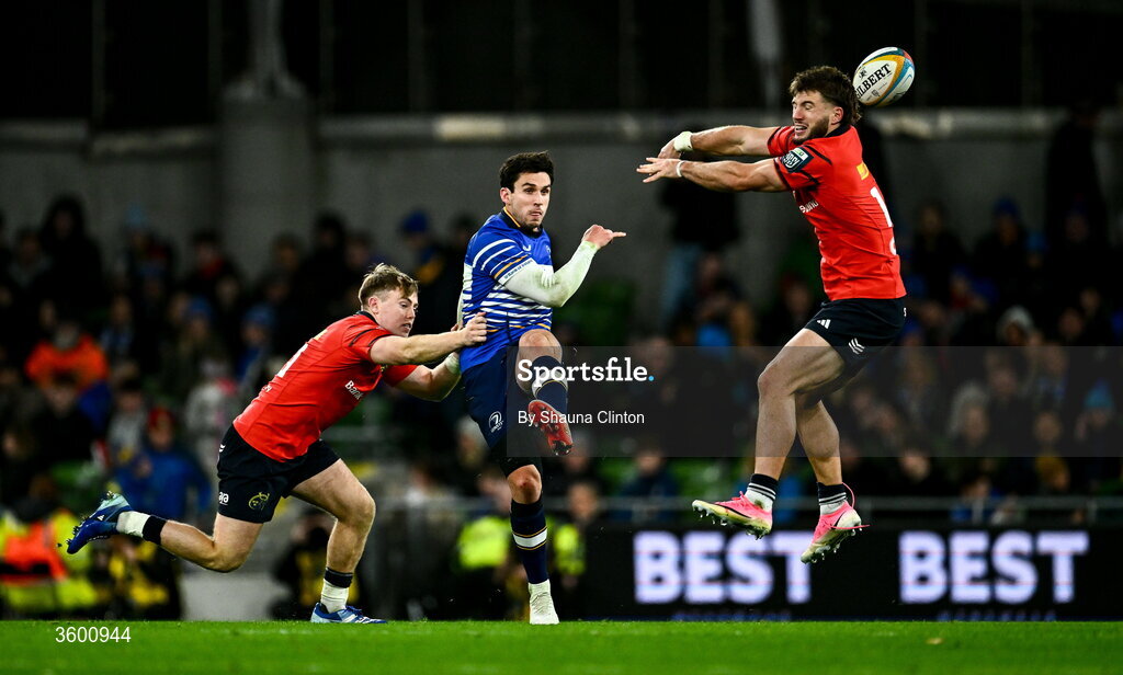 24 October 2026; Joey Carbery of Leinster in action against Charlie O'Shea, left, and Alex Nankivell of Munster during the United Rugby Championship match between Leinster and Munster at the Aviva Stadium in Dublin. Photo by Shauna Clinton/Sportsfile