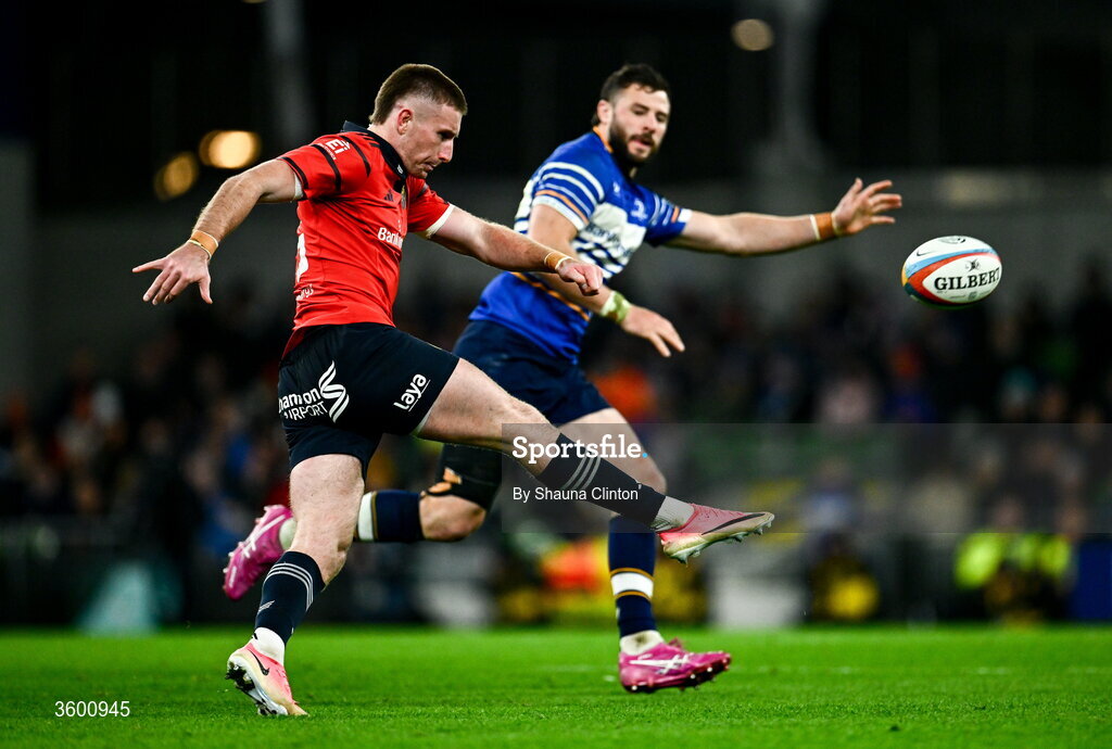 24 October 2026; Ben O'Connor of Munster kicks ahead of Robbie Henshaw of Leinster during the United Rugby Championship match between Leinster and Munster at the Aviva Stadium in Dublin. Photo by Shauna Clinton/Sportsfile
