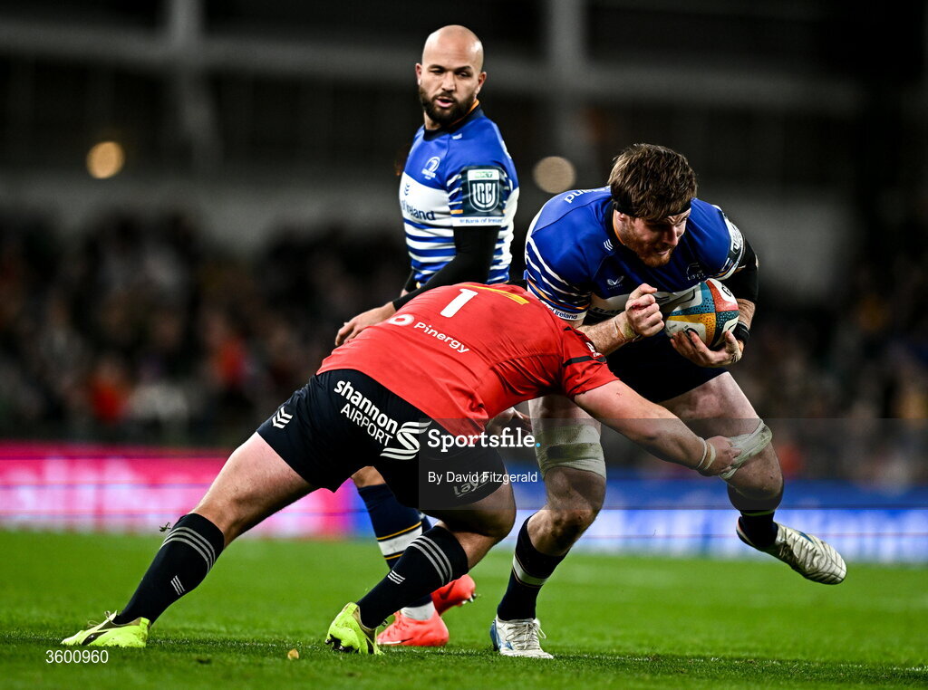 24 October 2026; Ryan Baird of Leinster is tackled by Josh Wycherley of Munster during the United Rugby Championship match between Leinster and Munster at the Aviva Stadium in Dublin. Photo by David Fitzgerald/Sportsfile