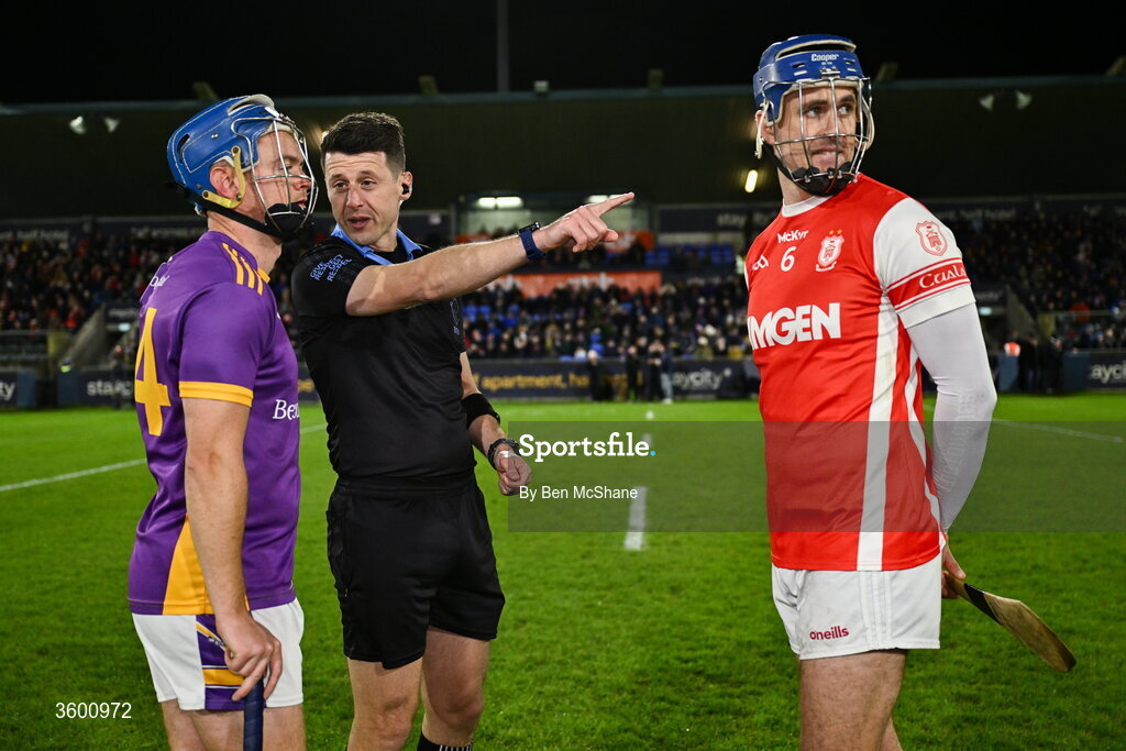 24 October 2026; Referee Sean Stack in conversations with team captains Oisin O'Rorke of Kilmacud Crokes, left, and Sean Moran of Cuala before the PTSB Dublin County Senior Club Hurling Championship final match between Cuala and Kilmacud Crokes at Parnell Park in Dublin. Photo by Ben McShane/Sportsfile