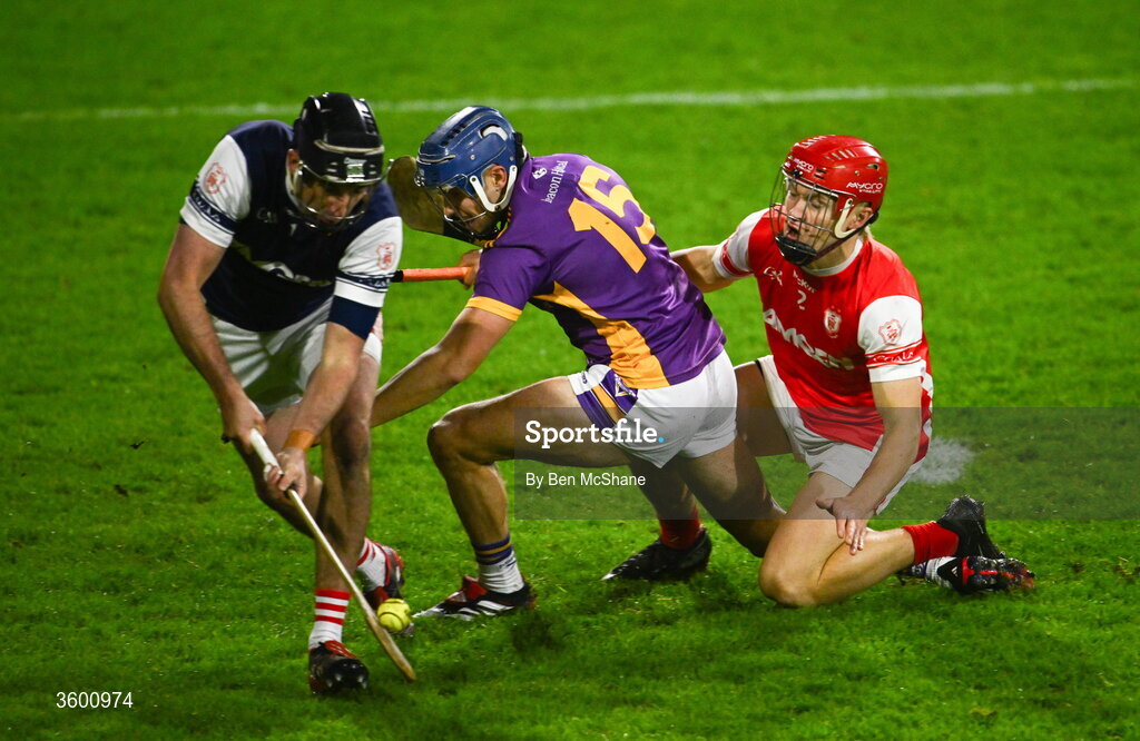 24 October 2026; Dara Purcell of Kilmacud Crokes is tackled by Cuala goalkeeper Sean Brennan, left, and Eoghan O'Callaghan of Cuala during the PTSB Dublin County Senior Club Hurling Championship final match between Cuala and Kilmacud Crokes at Parnell Park in Dublin. Photo by Ben McShane/Sportsfile