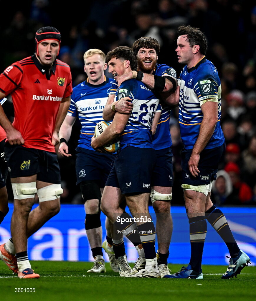 24 October 2026; Charlie Tector, 23, of Leinster celebrates with team-mates Ryan Baird and James Ryan, right, after scoring their side's third try during the United Rugby Championship match between Leinster and Munster at the Aviva Stadium in Dublin. Photo by David Fitzgerald/Sportsfile
