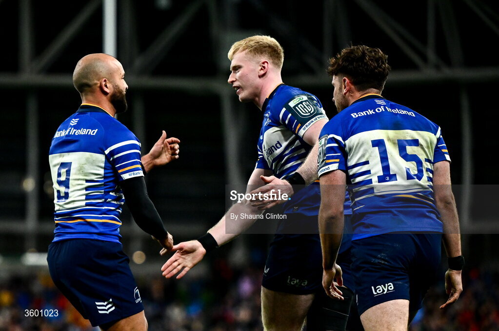 24 October 2026; Jamie Osborne of Leinster celebrates with team-mates Jamison Gibson-Park, left, and Hugo Keenan, right, after scoring their side's fourth try during the United Rugby Championship match between Leinster and Munster at the Aviva Stadium in Dublin. Photo by Shauna Clinton/Sportsfile