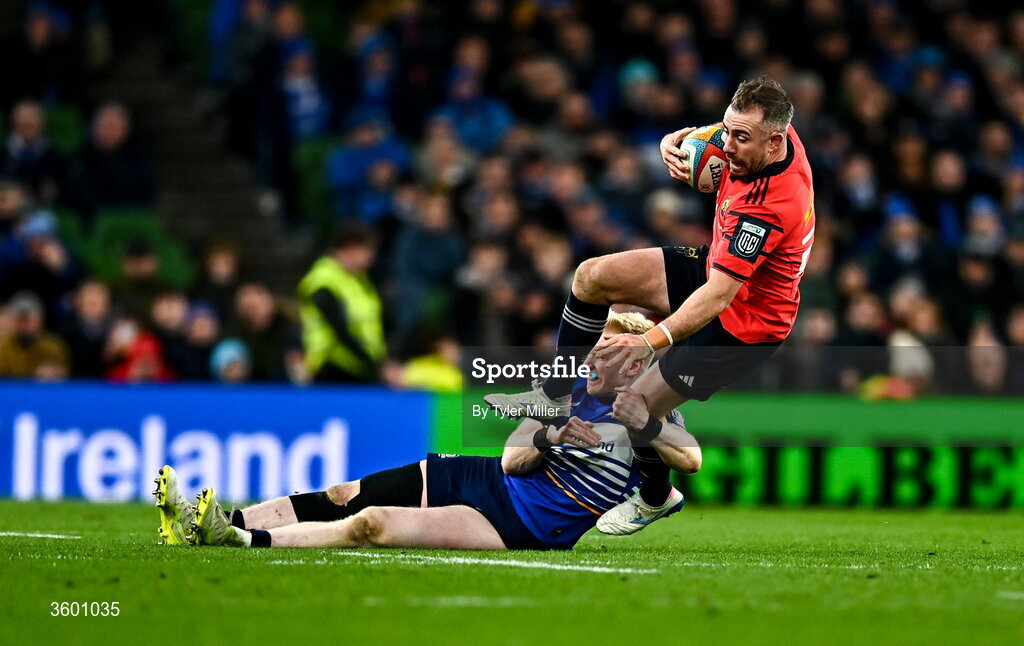 24 October 2026; JJ Hanrahan of Munster is tackled by Jamie Osborne of Leinster during the United Rugby Championship match between Leinster and Munster at the Aviva Stadium in Dublin. Photo by Tyler Miller/Sportsfile