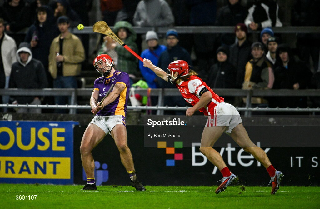 24 October 2026; Alex Considine of Kilmacud Crokes pucs a point despite the tackle of Cian O'Callaghan of Cuala during the PTSB Dublin County Senior Club Hurling Championship final match between Cuala and Kilmacud Crokes at Parnell Park in Dublin. Photo by Ben McShane/Sportsfile