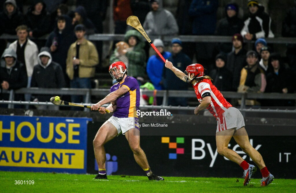 24 October 2026; Alex Considine of Kilmacud Crokes pucs a point despite the tackle of Cian O'Callaghan of Cuala during the PTSB Dublin County Senior Club Hurling Championship final match between Cuala and Kilmacud Crokes at Parnell Park in Dublin. Photo by Ben McShane/Sportsfile