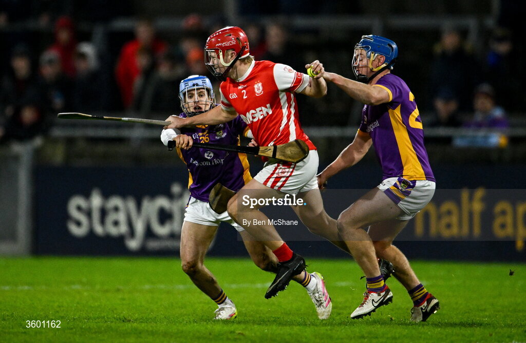 24 October 2026; Eoghan O'Callaghan of Cuala is tackled by Sean Purcell, left, and Oisin O'Rorke of Kilmacud Crokes during the PTSB Dublin County Senior Club Hurling Championship final match between Cuala and Kilmacud Crokes at Parnell Park in Dublin. Photo by Ben McShane/Sportsfile