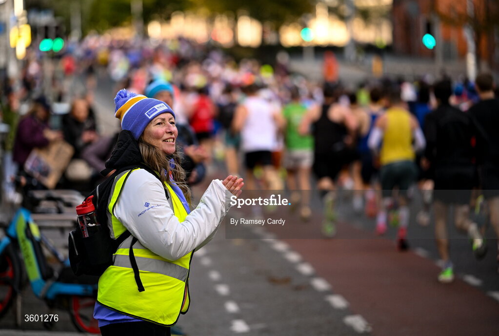 25 October 2026; Staff encourages the participants during the 2026 Irish Life Dublin Marathon, as thousands of runners took to the streets of Dublin for the 45th running of the event. Photo by Ramsey Cardy/Sportsfile