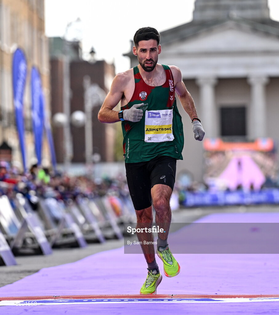 25 October 2026; National champion Hugh Armstrong of Ireland crosses the line during the 2026 Irish Life Dublin Marathon, as thousands of runners took to the streets of Dublin for the 45th running of the event. Photo by Sam Barnes/Sportsfile