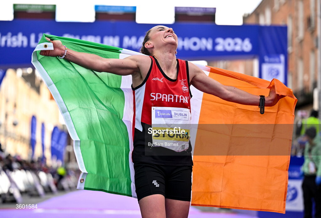25 October 2026; Women's National champion Judith Storm of Ireland celebrates after the 2026 Irish Life Dublin Marathon, as thousands of runners took to the streets of Dublin for the 45th running of the event. Photo by Sam Barnes/Sportsfile