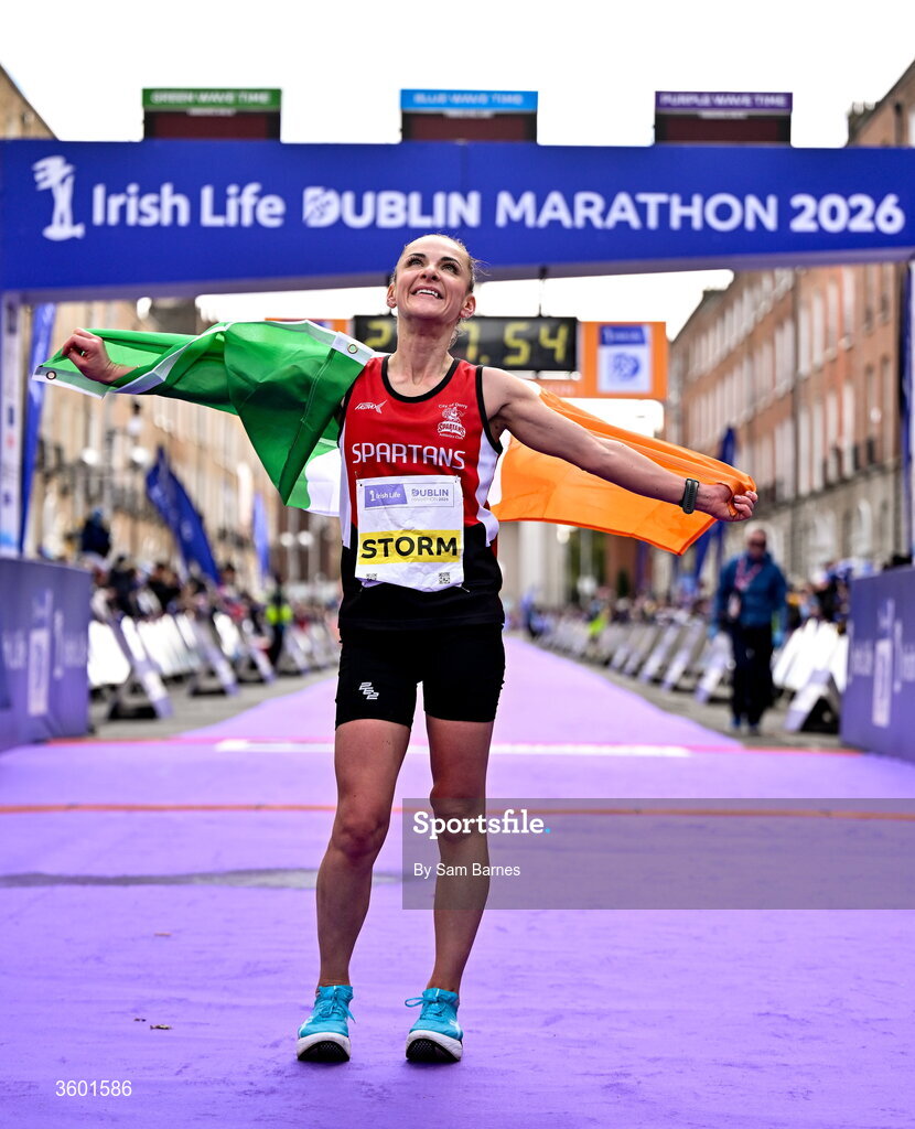 25 October 2026; Women's National champion Judith Storm of Ireland celebrates after the 2026 Irish Life Dublin Marathon, as thousands of runners took to the streets of Dublin for the 45th running of the event. Photo by Sam Barnes/Sportsfile
