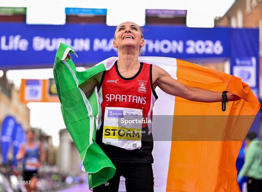 25 October 2026; Women's National champion Judith Storm of Ireland celebrates after the 2026 Irish Life Dublin Marathon, as thousands of runners took to the streets of Dublin for the 45th running of the event. Photo by Sam Barnes/Sportsfile